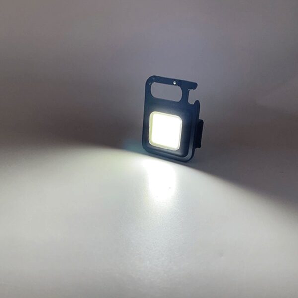 Mini lamparita Led recargable con destapador llavero lampara practico luz emergencia - Imagen 4